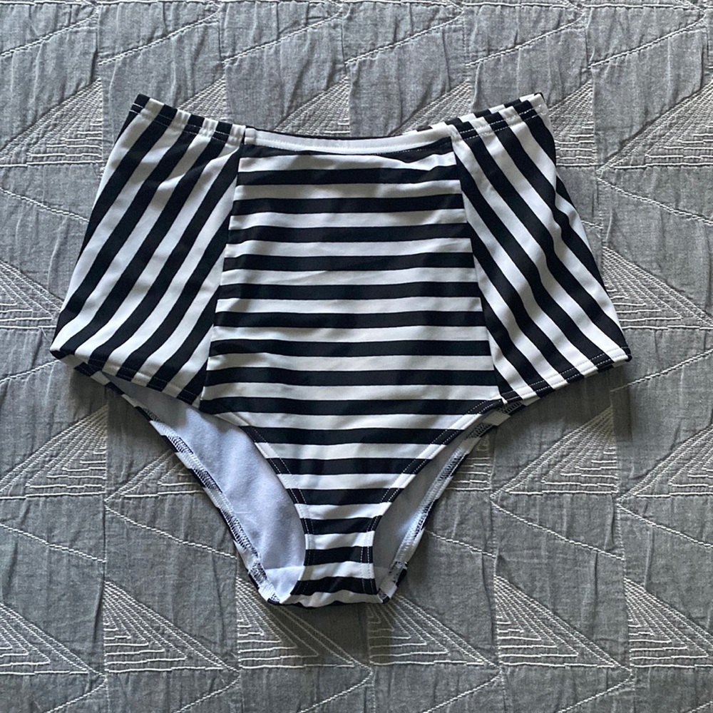 ASOS brand swim bottoms.